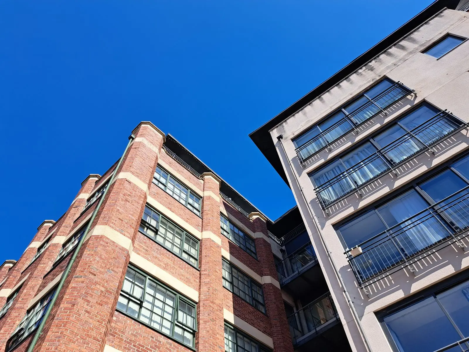 Modern apartment building exterior, an example of the kind of privately owned rental housing Section 8 vouchers can be used for